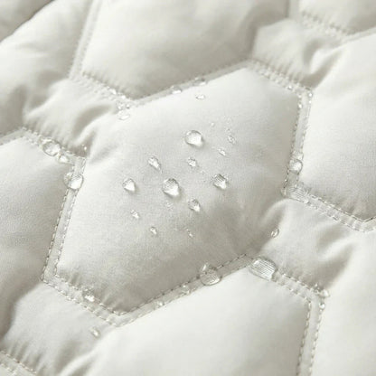 Langer Damen-Steppmantel mit Kapuze und geometrischem Steppmuster-Coats for women-Alpenkind